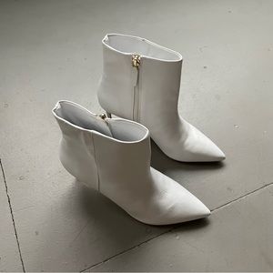 Schutz white pointed toe booties